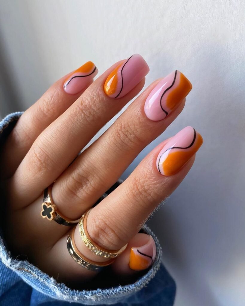 Summer Swirl Nails on Black and Orange nails polish 