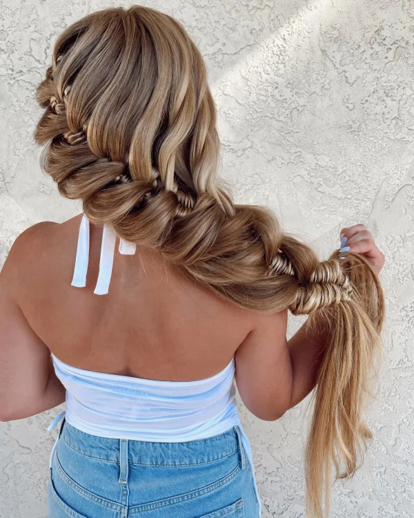 Long braided hairstyle for a chic festival look