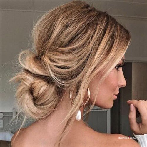 Messy bun daily hairstyles for curly frizzy hair