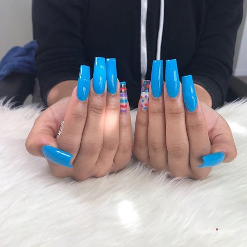 Long blue nails with summer strips design ideas