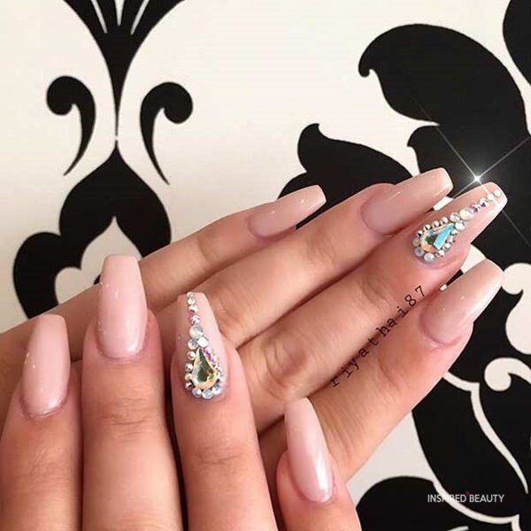 peach nails white large Rhinestone and small ones