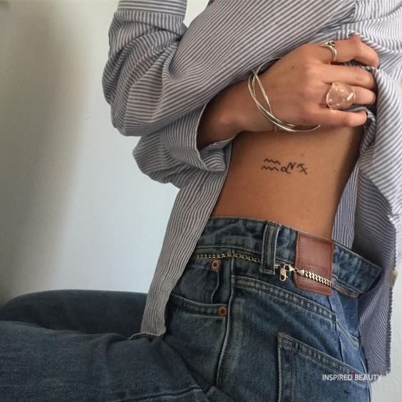 Waist small tattoo for woman 