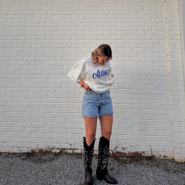 denim shorts with cowboy boots