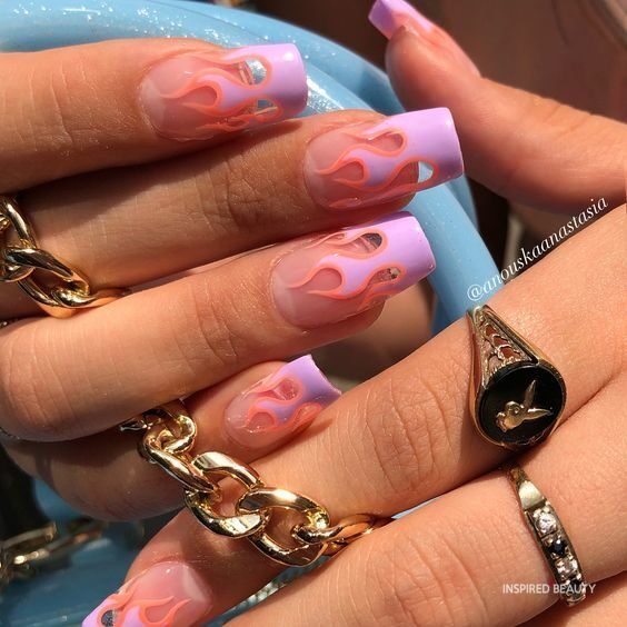 hot pink nails with diamonds on ring finger