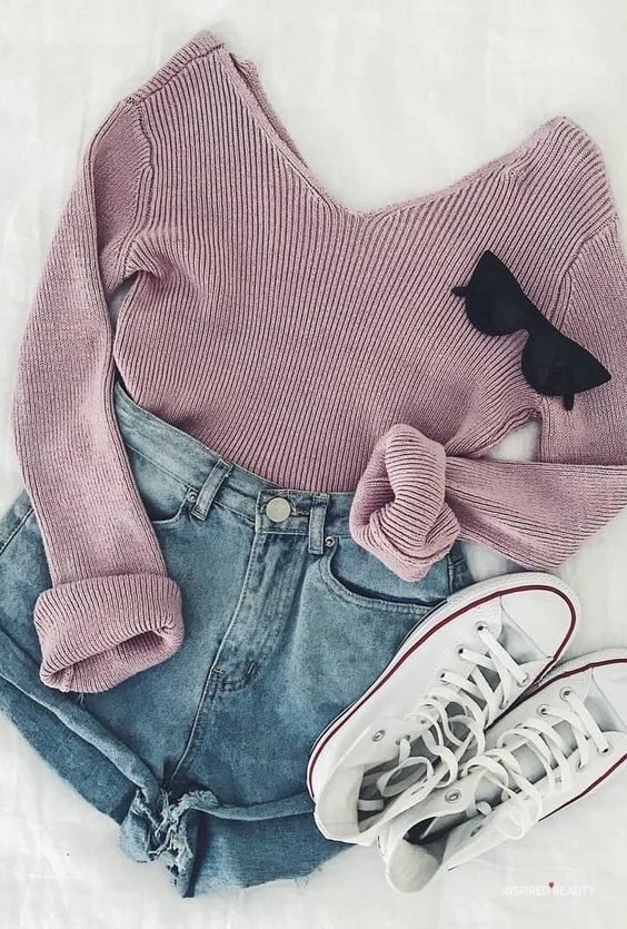 Sweater, jeans shorts and converse sneakers.  