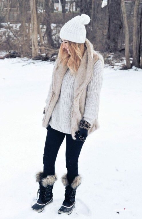 white winter hat, with sweater, mitten, snow boots 