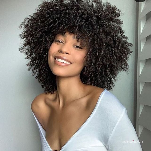 Tight curly bob hairstyle 