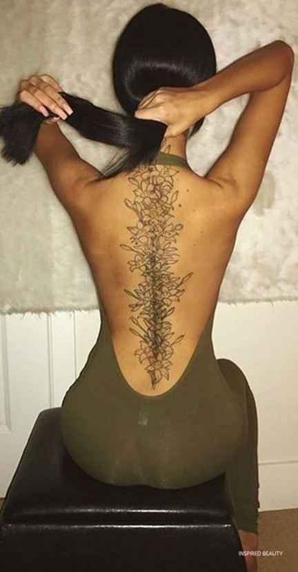 elegant female spine tattoo