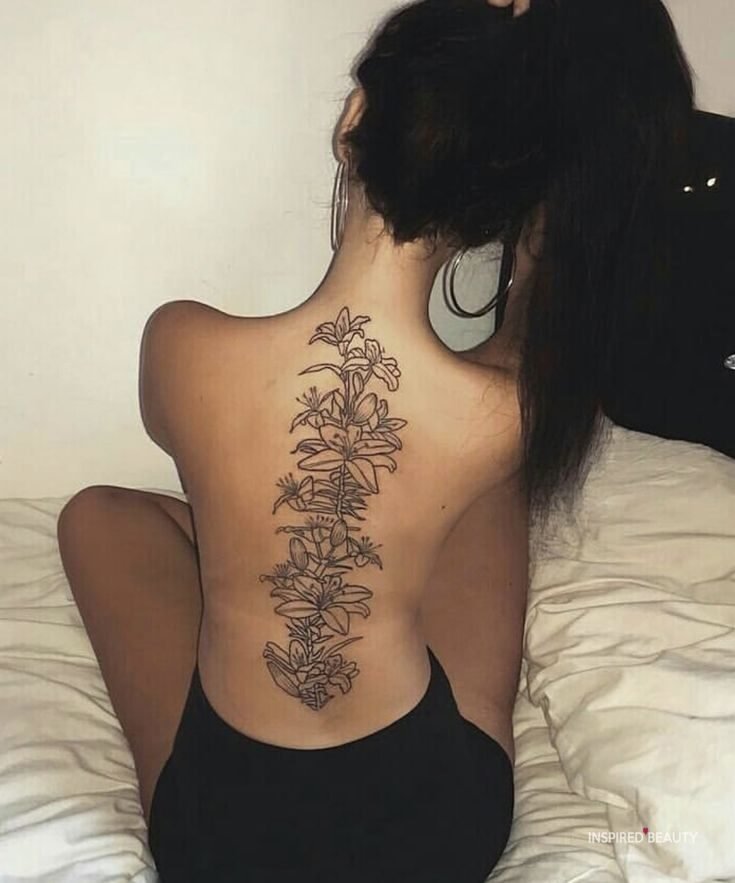 Leaves and Flower Spine Tattoo