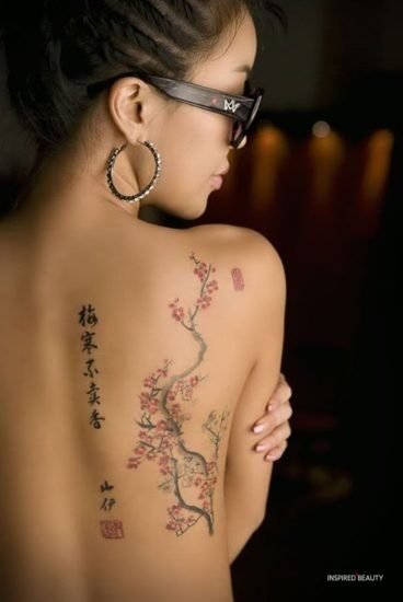 Floral spine tattoos