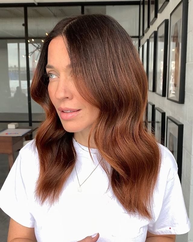 Red balayage on brown hair