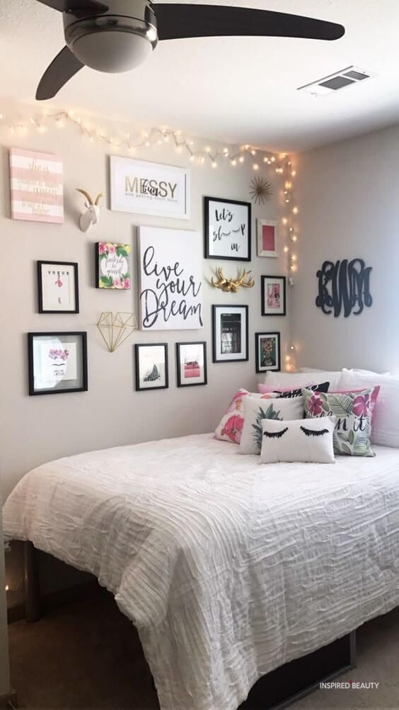 room decor with wall art and fairy lights