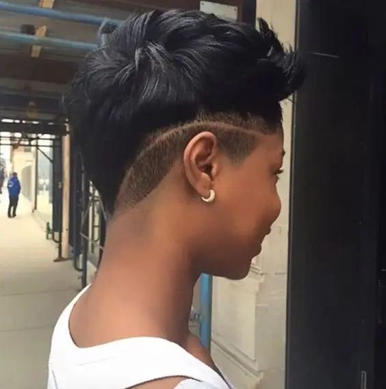 Relax hair with shaved sides and pattern hairstyle for black woman