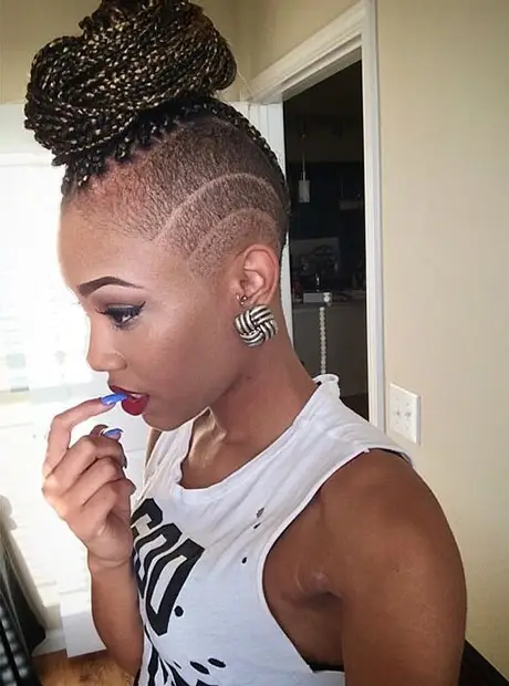 Half Shaved with braids on the top hairstyle idea