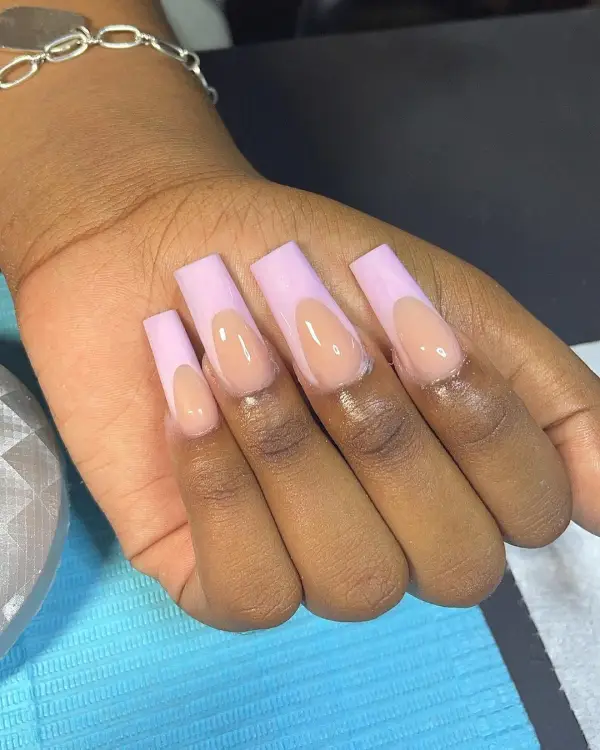Long square French tip with light pink nail polish
