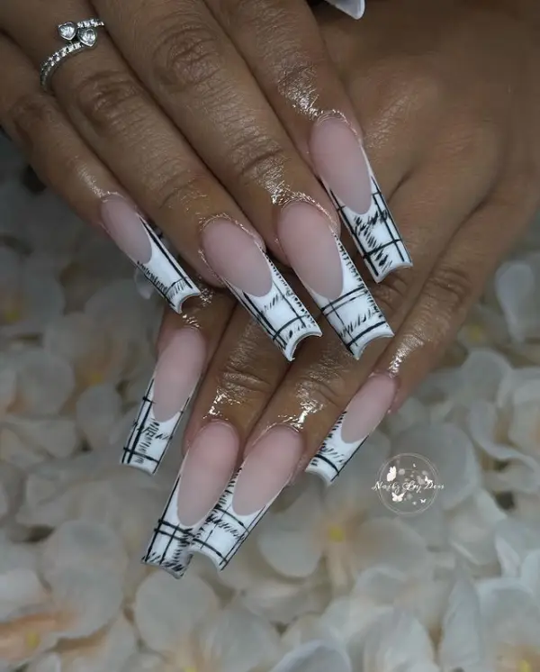 White Long French tip nails with black and white checkered pattern design
