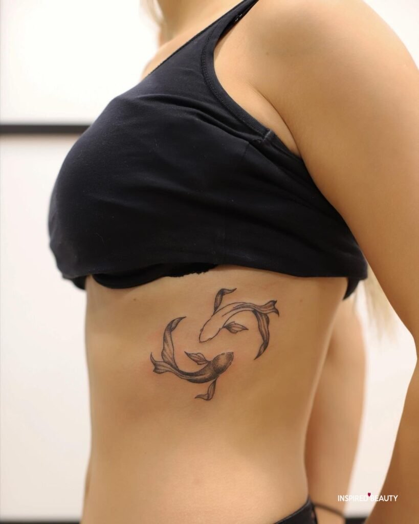 Goldfish Rib Cage Tattoo
