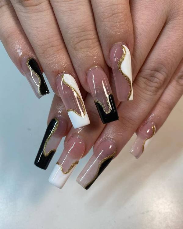 black white and gold nails