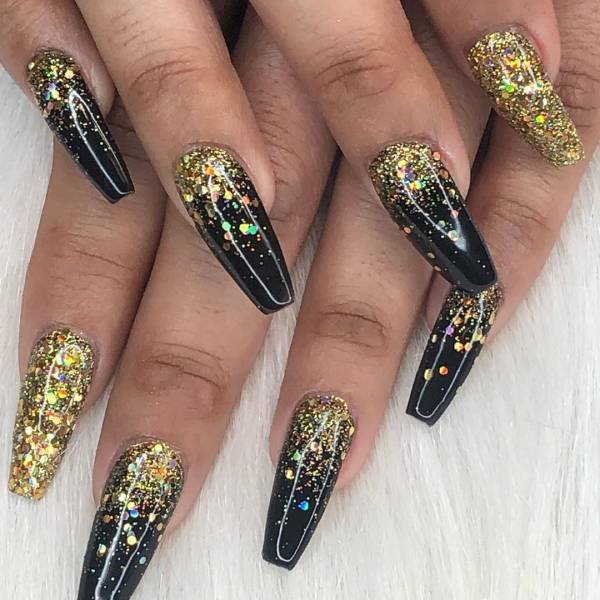 long Ombre Black and Gold Nails with glitter 