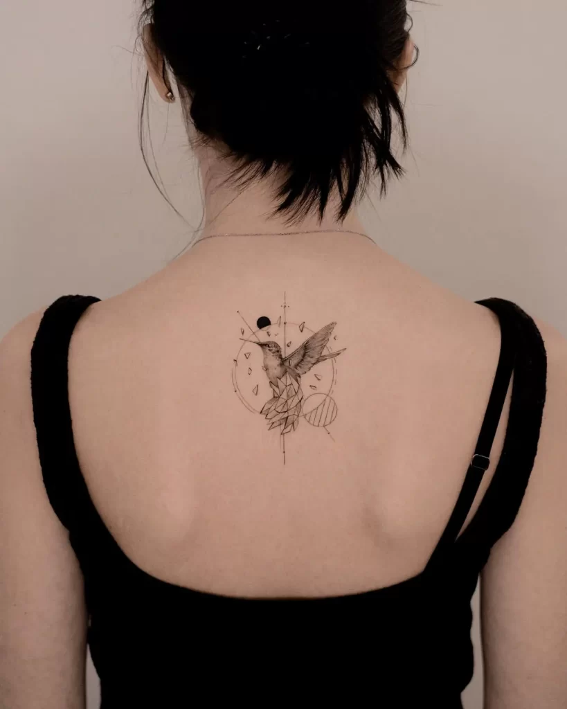 Hummingbird tattoo back