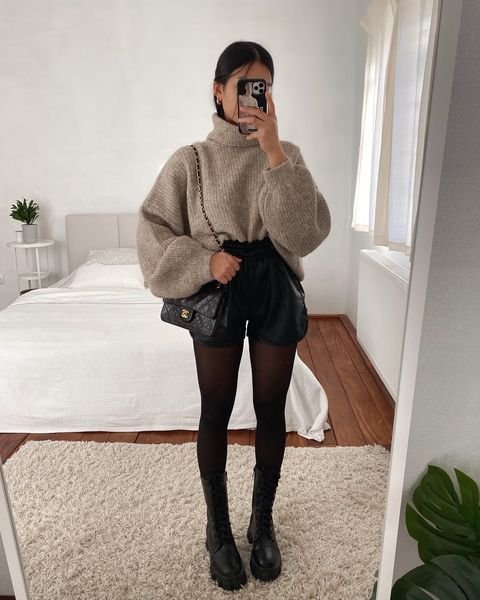 oversized sweater and leather shorts