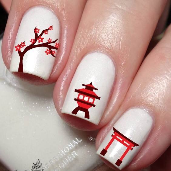 Cute white nails with red and brown design 