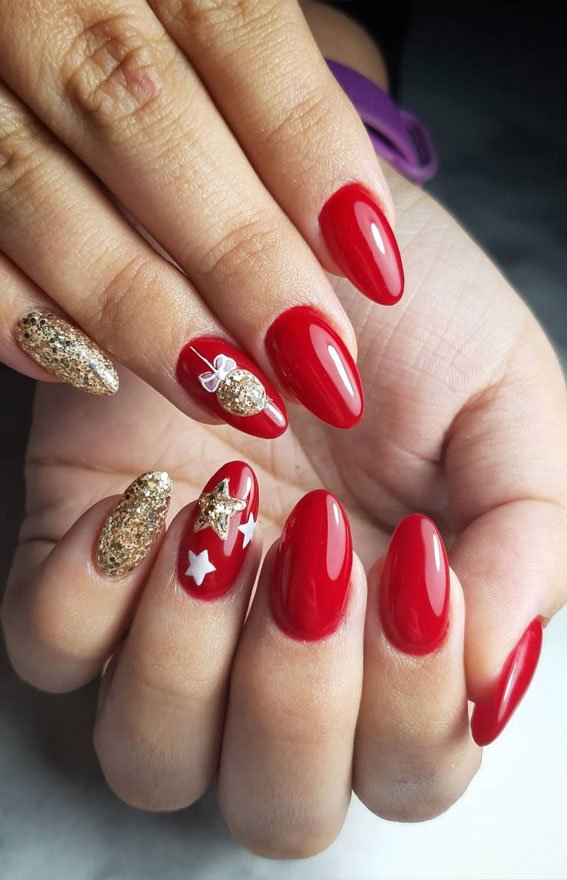 Cute oval red and gold nails with Christmas Ornament design ideas 