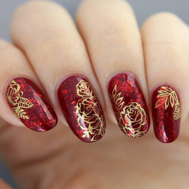 almond red nails with gold rose design ideas