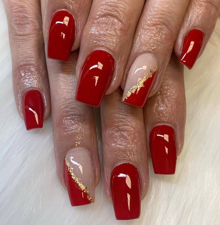 Red nails with unique gold half side design ideas 
