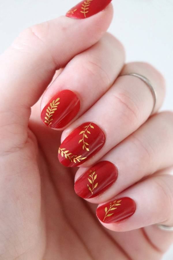 Red and gold short Christmas nails design ideas