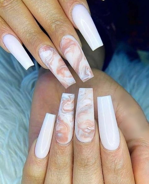 white nails with marble design