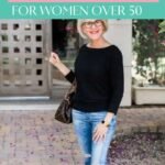 50+ year old women fashion sense in denim jeans and black blouse