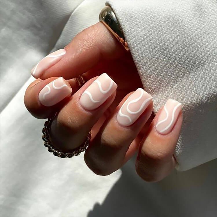 swirly short white nails