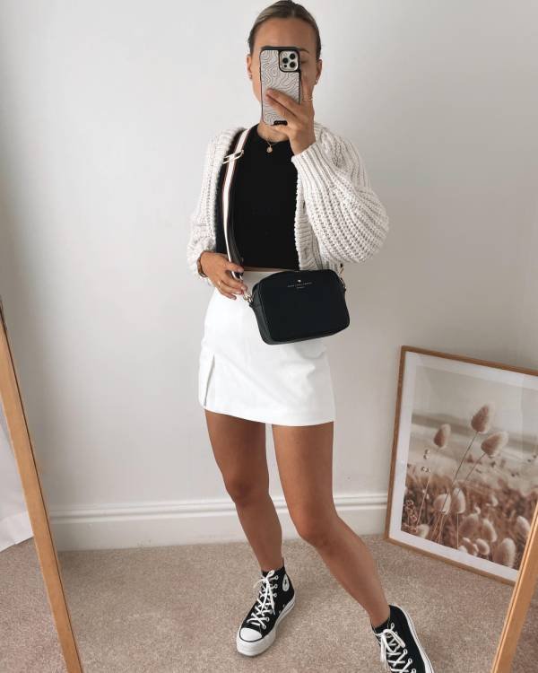 White Cardigan Outfits for Work, with Skirt, Black Undershirt, and Sneakers