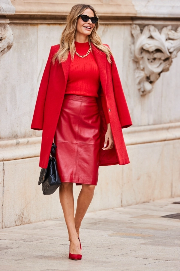 Red coat, with a red sweater and red leather skirt Professional Winter Work Outfits