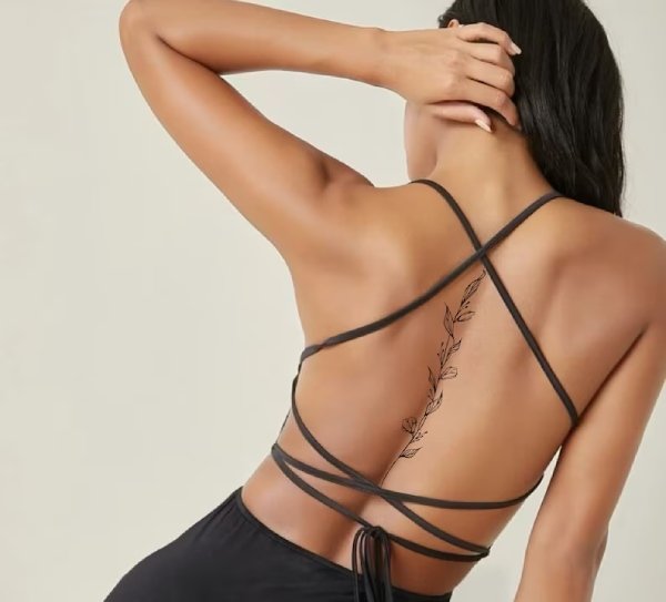 Baddie women's feminine spine tattoos