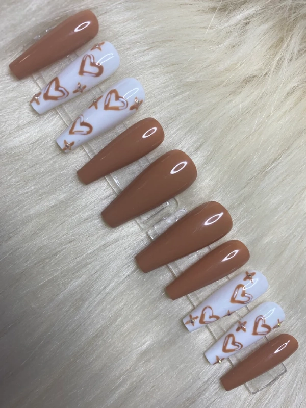 white and brown heart nails