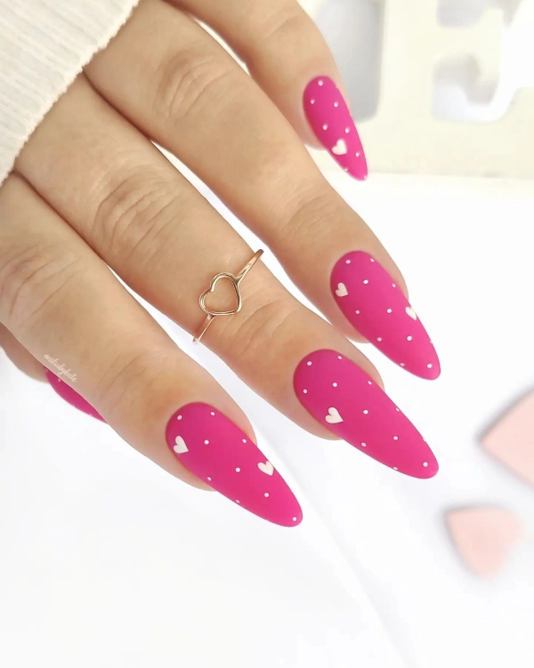 hot pink nails with white hearts