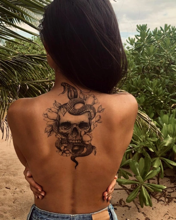 Feminine Pretty Skull Tattoos on the back
