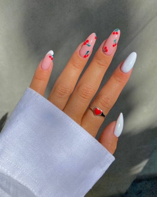White nails with cherry design