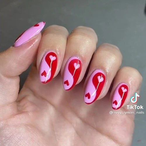 Red and pink heart valentines yin yang nails design idea
