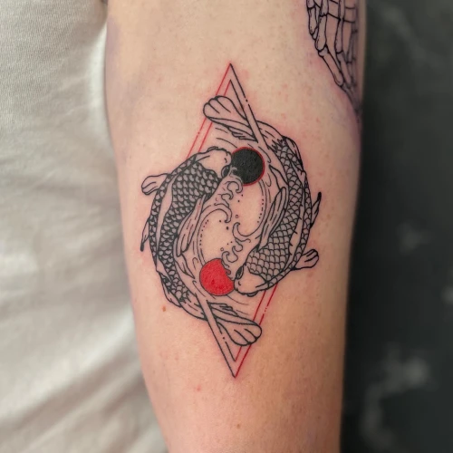 Yin Yang Koi fish Black and Red Tattoo Idea