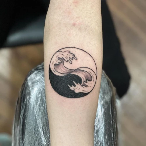 Yin Yang Ocean Waves Circle Tattoo Idea
