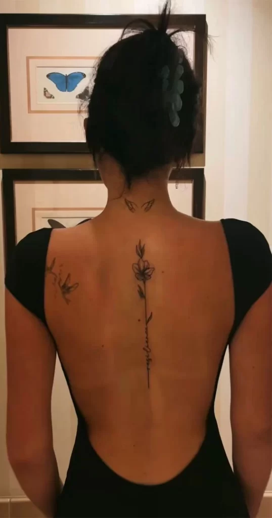 flower spine tattoo