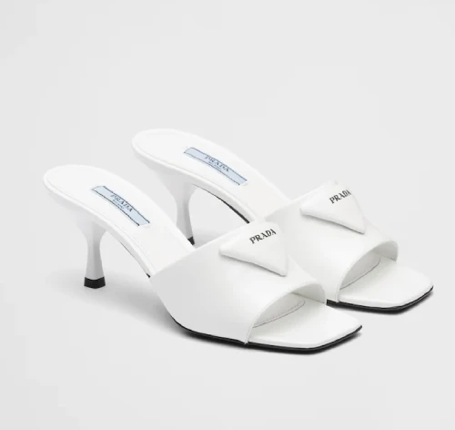 Brushed leather-heeled slides Sandals from Chanel 