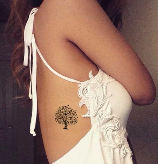 cute tree tattoo idea for woman