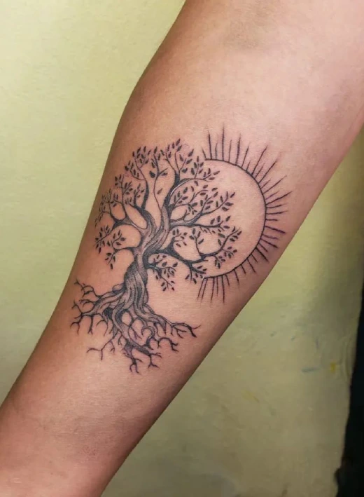 Sun Symbolism in Tree Tattoo