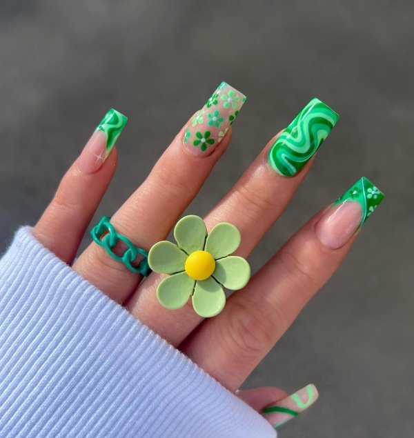 Clover Pond Mani, with swirl and green colors on square shape nails