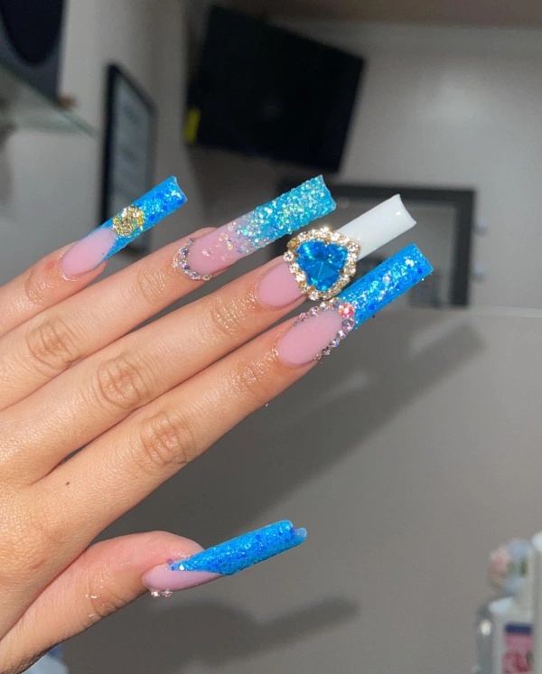 blue long nails with gold gems