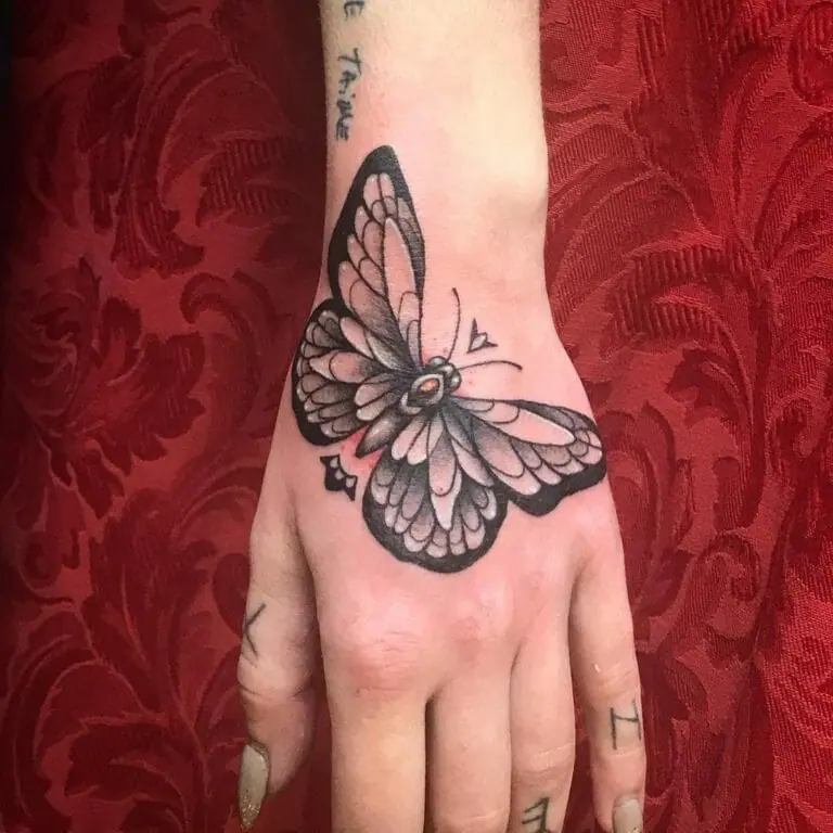 hand butterflies tattoo